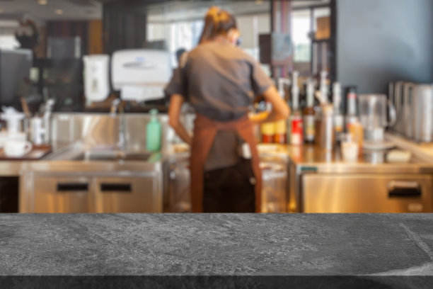 空的大理石桌面与咖啡店咖啡馆餐厅柜台模糊的背景图片下载