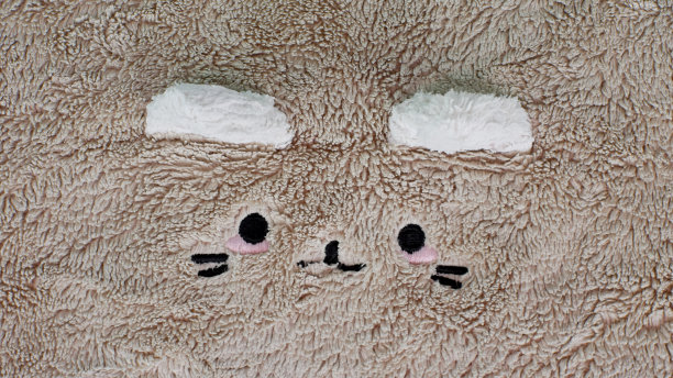 棉绒面料，米黄色，可爱的猫脸图片下载