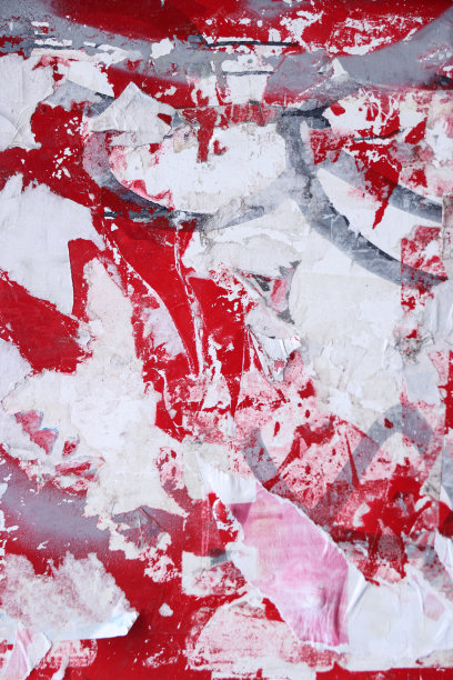 从用作广告牌的墙上撕下来的纸片图片下载