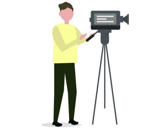 男摄影师用摄像机拍摄图片下载