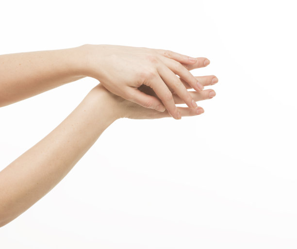 女性双手做按摩，互相触摸，在白底上互相孤立的抚摸图片下载