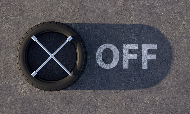 轮胎上有扳手。投影看起来像一个标记为OFF的开关滑动按钮图片下载