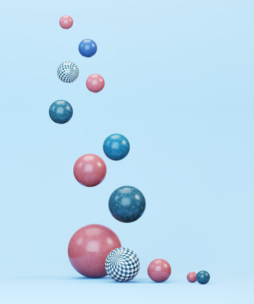 色彩斑斓的球体漂浮在浅蓝色的背景上图片下载