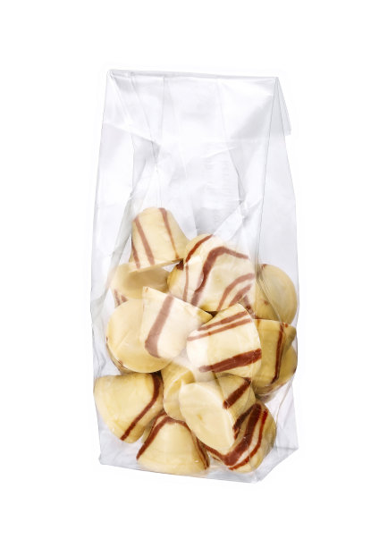 奢侈的巧克力在白色的塑料袋里隔离图片下载