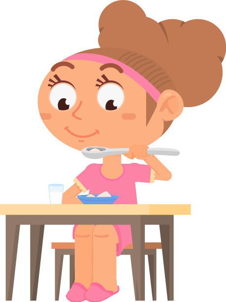 快乐的孩子吃女孩坐在餐桌上的孩子图片下载