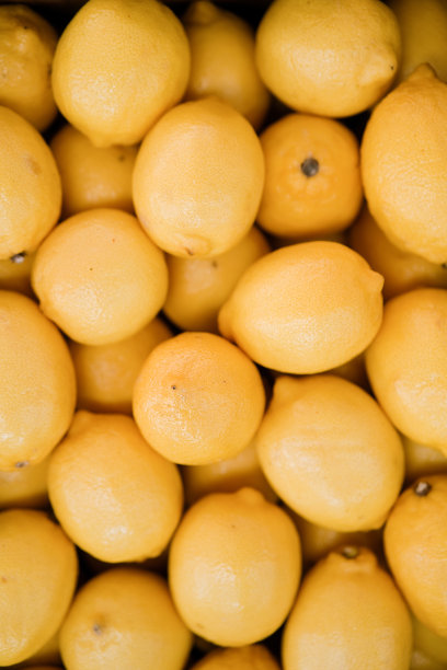 成熟的黄色柠檬特写背景或纹理图片下载