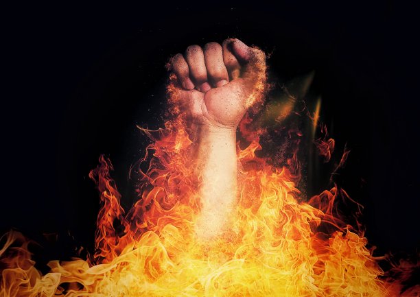 一个拳头冲破火焰的3D插图图片下载