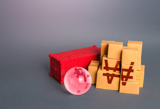 韩币和盒装商品的象征。全球范围内的生产、仓储和航运物流。产品制造、运输、销售。业务全球化。世界贸易经济。图片下载