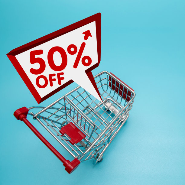 购物折扣- 50%折扣与购物车孤立的白色图片下载