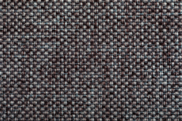 棕色的面料质地。家具装饰用纺织品。浮雕图案。编织纤维。这种材料触感很柔软。极简主义的概念。高细节微距摄影背景或壁纸。图片下载