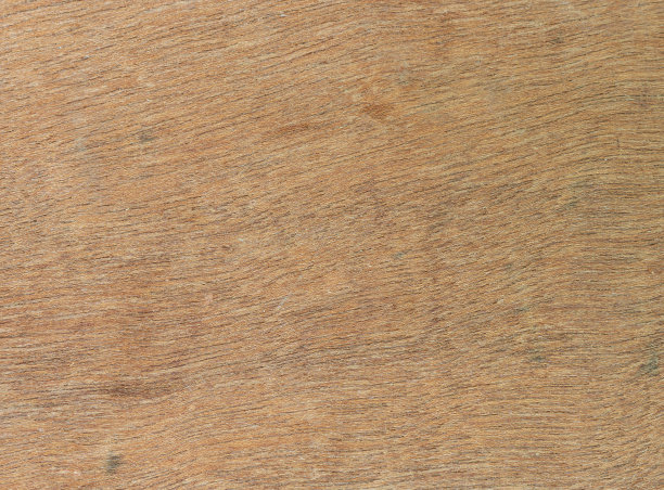 浅棕色木材背景粗糙的表面木材不均匀的着色，这是木材所特有的。图片下载