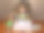 一个可爱的小女孩坐在桌边画画很开心。图片下载