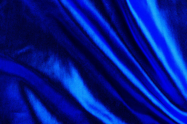 蓝色缎面织物作为抽象背景。图片下载