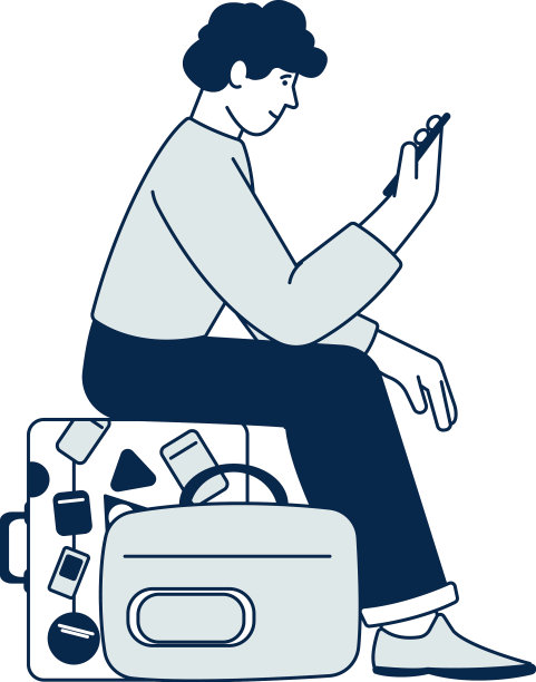 等待的旅行者坐在旅行袋和图片下载