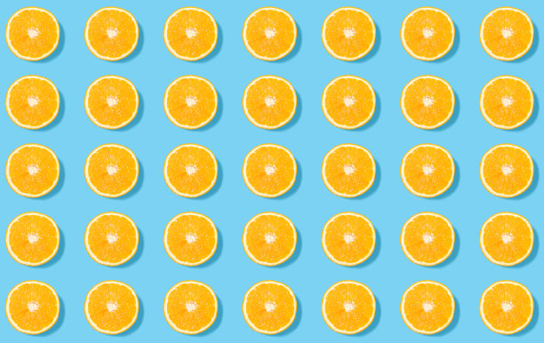 夏季热带图案的橙色圆圈在蓝色的背景图片下载