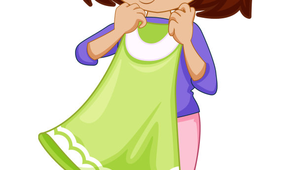 可爱的女孩在试穿裙子图片下载