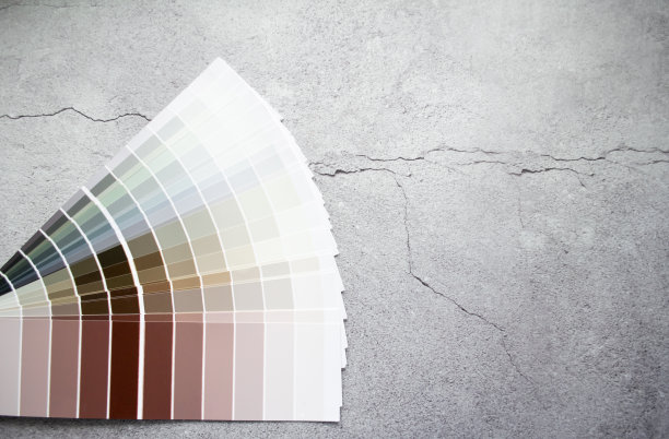 为室内设计提供油漆样色。灰色混凝土裂缝背景，大地色调图片下载