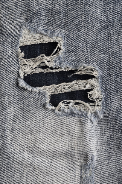 牛仔裤撕裂质感图片下载