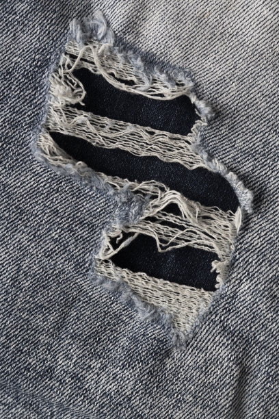 牛仔裤撕裂质感图片下载