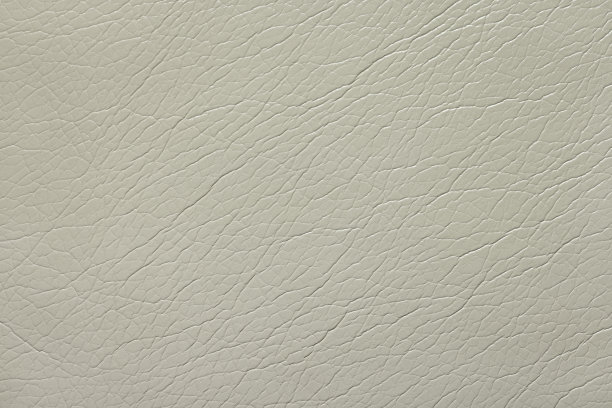 背景，照片纹理从米色人造皮革，工作室拍摄。图片下载