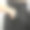 特写图像女性黑色缎子长裤与宽腰带和手在口袋。图片下载