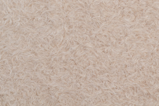 米色皮毛纹理特写。地毯桩图片下载