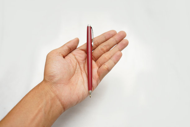 手握一支笔图片下载