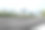 模糊空旷的柏油路和现代化的城市建筑图片下载