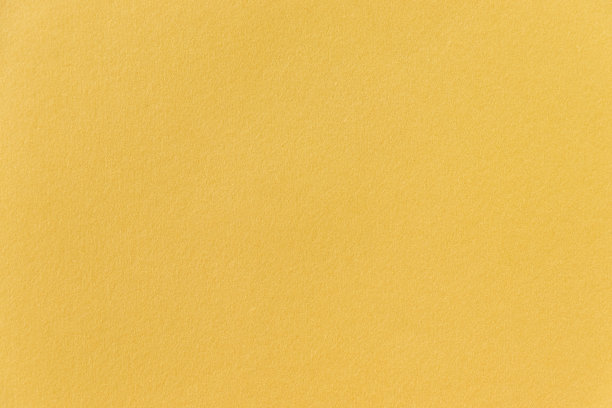 亮黄色墙纸表面纹理图片下载