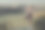 年轻的白人妇女练习瑜伽户外全景景观在日落，运动女孩做冥想练习在山顶上图片下载