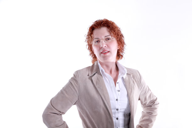 白色西装女商人的肖像在白色的背景图片下载