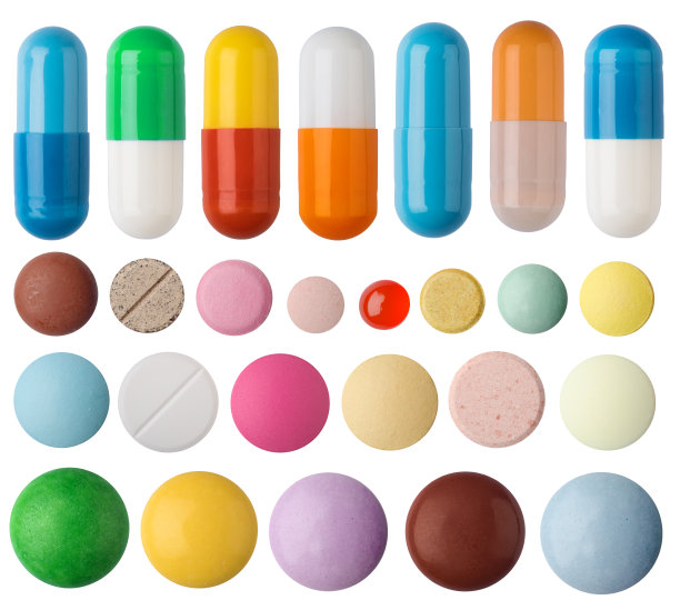 药片，药片，胶囊，药物都在白色背景上不同种类的药片，五颜六色的药片。医学和药学主题的设计元素。图片下载