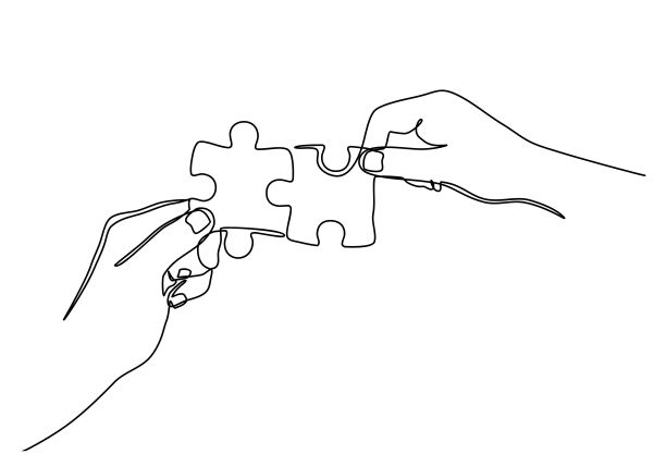 业务团队的概念和整合与困惑。双手解决两个拼图。图片下载