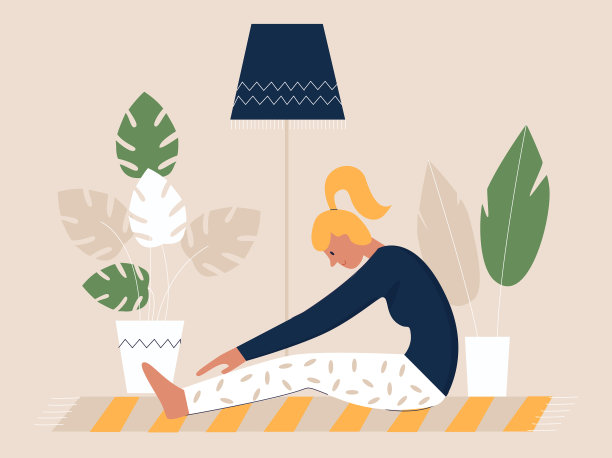 年轻女子在垫子上练习瑜伽图片下载