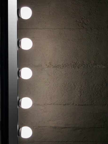 混凝土背景的化妆灯图片下载