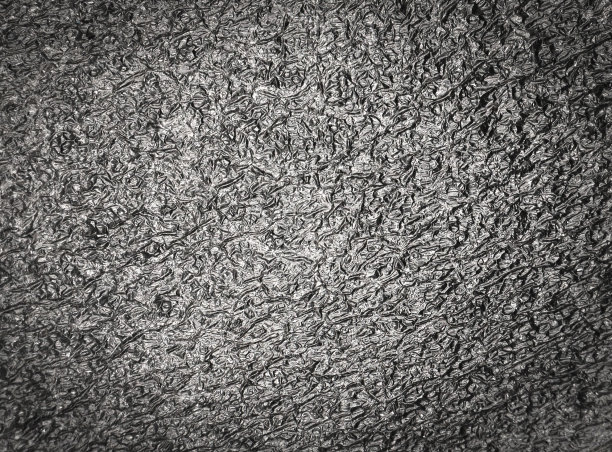 特写黑色的塑料表面皱褶图片下载