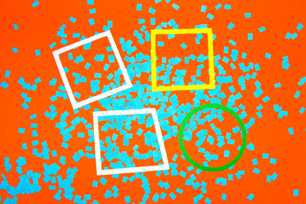 橙色背景配蓝色碎纸，抽象设计，四个彩色画框作为复制空间，创意艺术设计图片下载