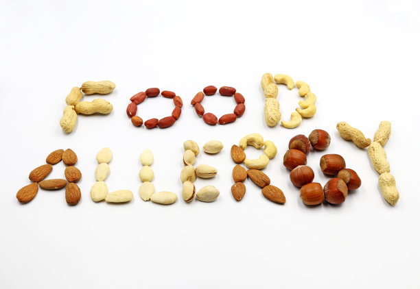 食物过敏这个词是由坚果形成的，过敏原图片下载