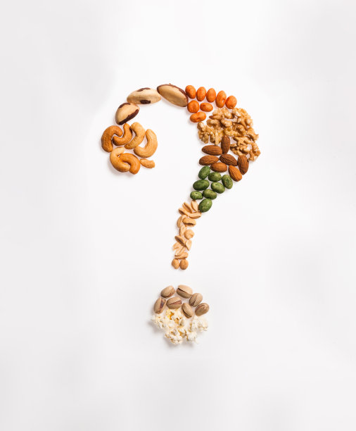程式化的问号由腰果，花生，巴西坚果，核桃，杏仁，爆米花和开心果，孤立在白色图片下载
