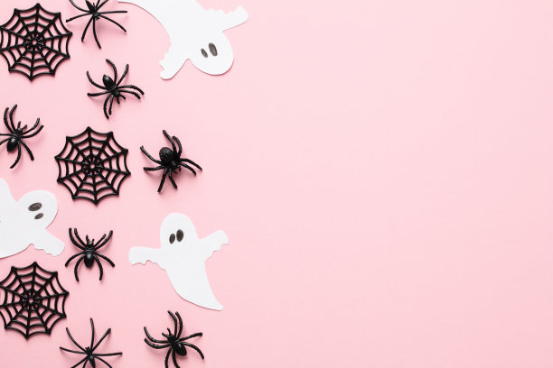 万圣节装饰在粉彩粉色的背景。万圣节节日快乐的概念。平铺，俯视图，拷贝空间图片下载
