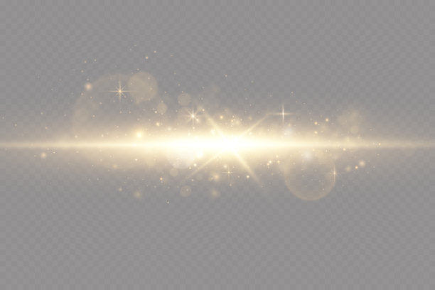 金色的光粒子。金色的光。光闪耀。在透明背景上孤立的恒星。图片下载