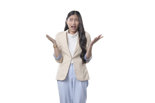 印尼商业妇女在白色看起来困惑的两个手掌面对上图片下载