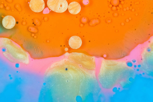 五彩缤纷的橙蓝色和粉色抽象泼墨图片下载