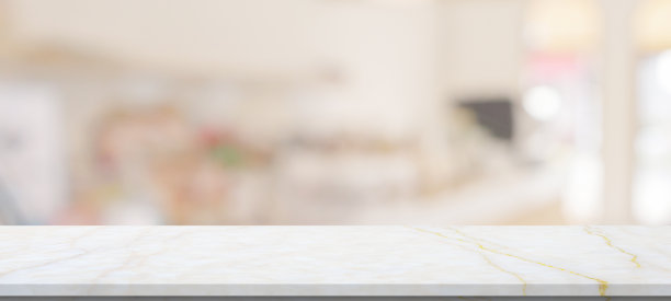 大理石桌面与模糊的厨房咖啡馆餐厅内部背景图片下载