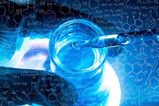蓝色的科学试管，实验室用的玻璃器皿用滴管将液体滴入试管。科学实验室试管，实验室设备图片下载