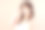 快乐开朗的年轻亚洲女性与两个辫子自然美容化妆，时尚模特，健康健康，美丽的女孩皮肤护理和面部治疗。孤立在米黄色粉红色的背景。图片下载