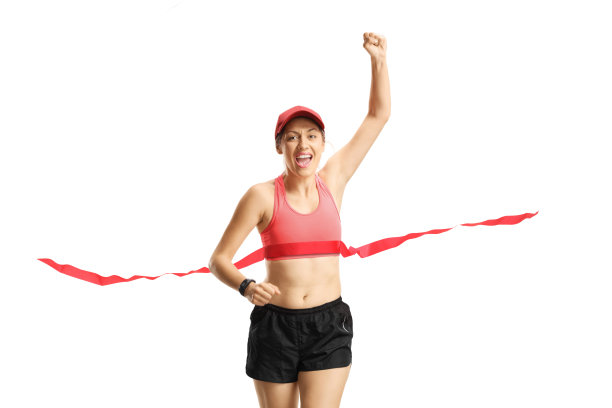 幸福的年轻女子站在终点线上图片下载