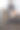 一对十几岁的情侣在建筑物环绕的楼梯上拍照。图片下载