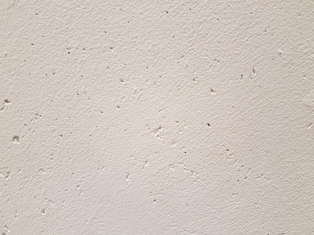 米色彩绘墙图片下载