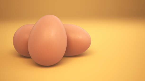 鸡蛋在黄色背景下呈棕色图片下载